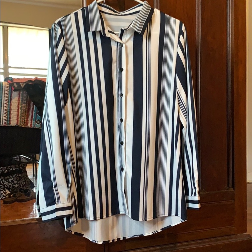 Women’s loose fit button down collared shirt.